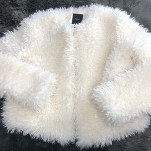 White faux fur coat